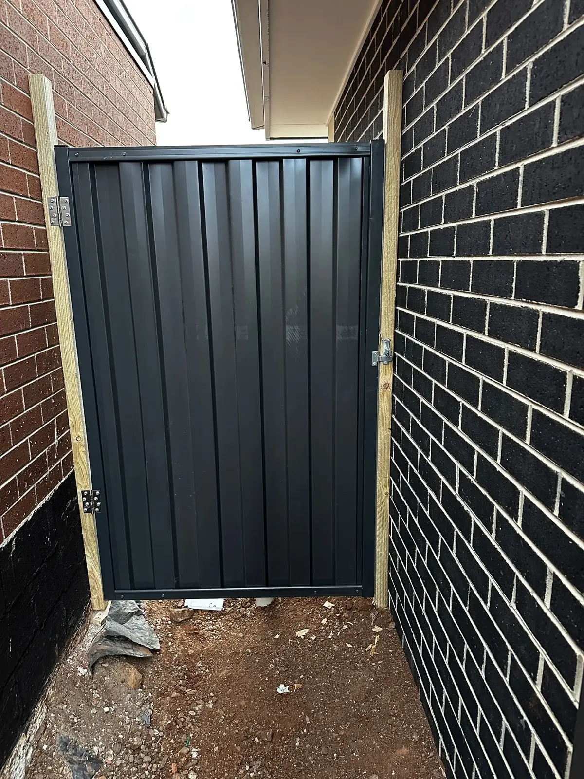 Black side access gate — APS Pro Fencing