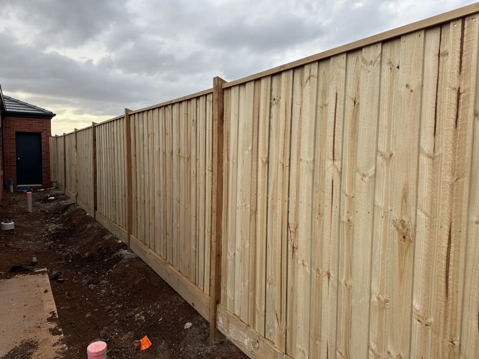 Capped timber boundary — APS Pro Fencing